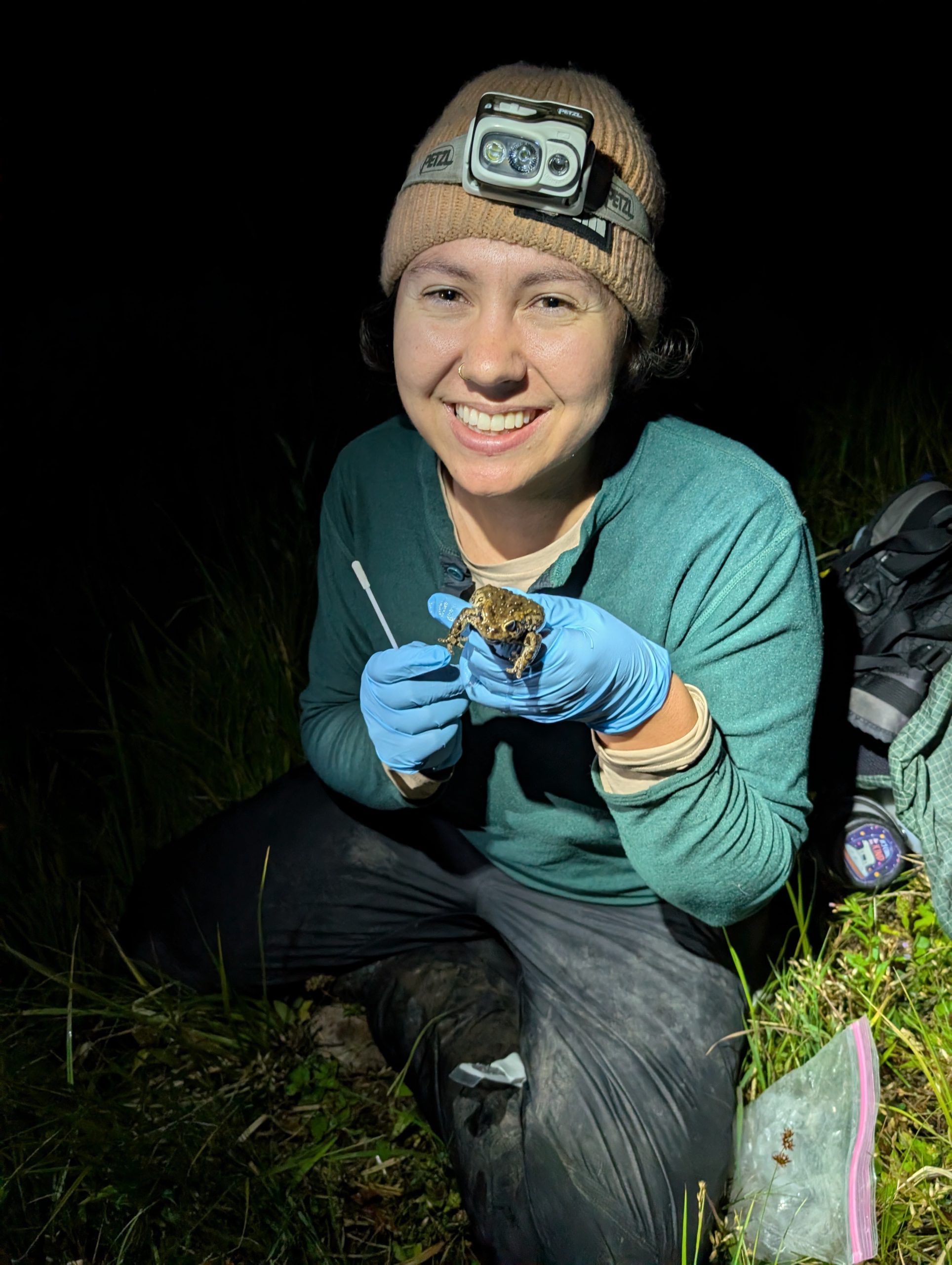 Jenna Zarlingo holding a Boreal toad