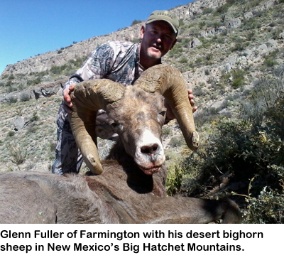 Glenn Fuller of Farmington with his desert bighorn sheep in New Mexico's Big Hatchet Mountains.