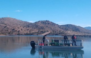 Barge deploying canopies.