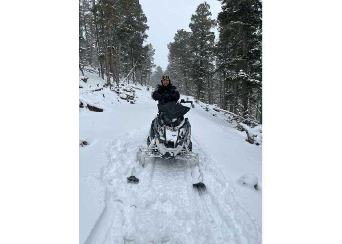 Snowmobile patrol in the Valle Vidal.