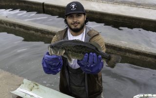 Man holding a largemouth bass