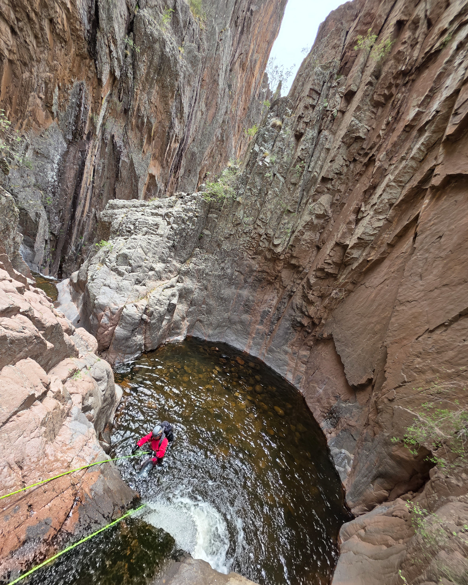 Rappelling down into the river